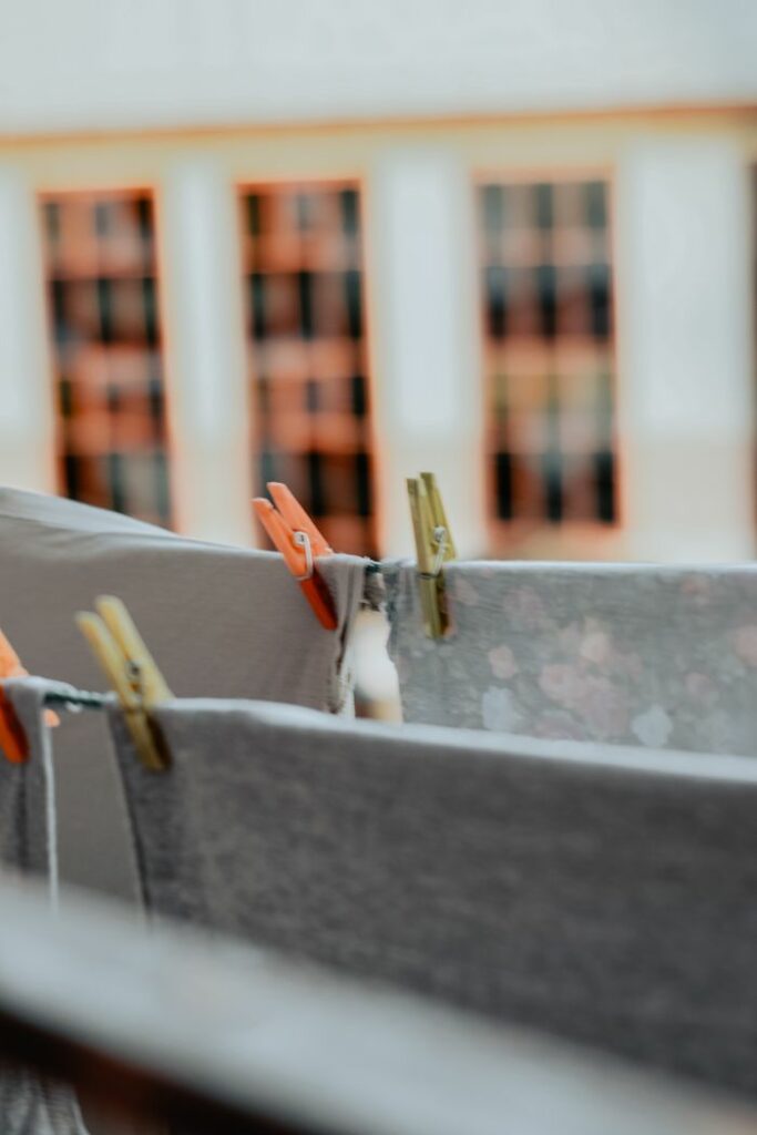 A detailed view of clothespins on laundry lines outside, adding a rustic touch.