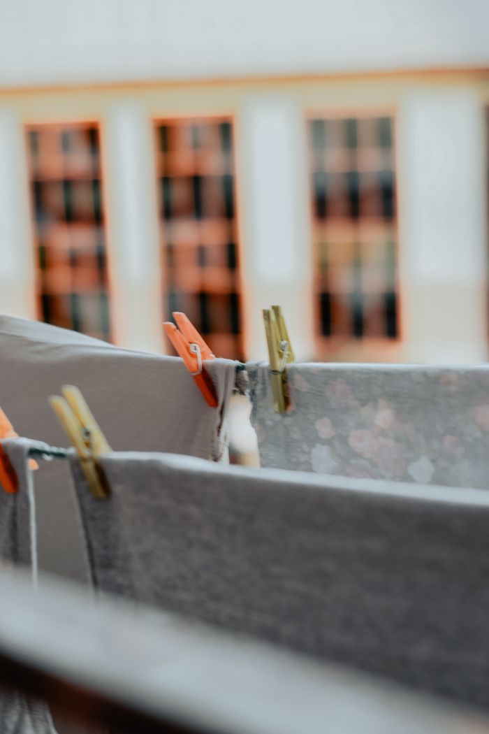 A detailed view of clothespins on laundry lines outside, adding a rustic touch.